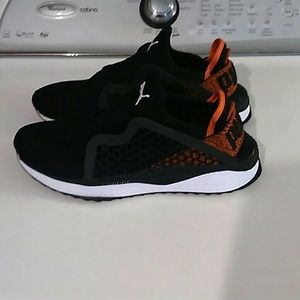 black and orange puma sneakers